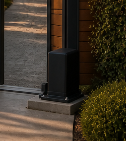 Sliding gate operator mounted beside the existing cedar gate